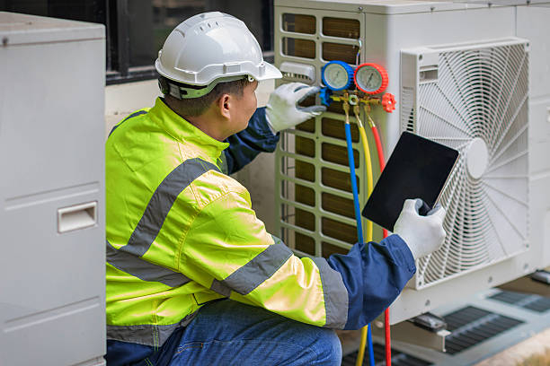 Professional Hvac Installation technician working in Powells Point, NC
